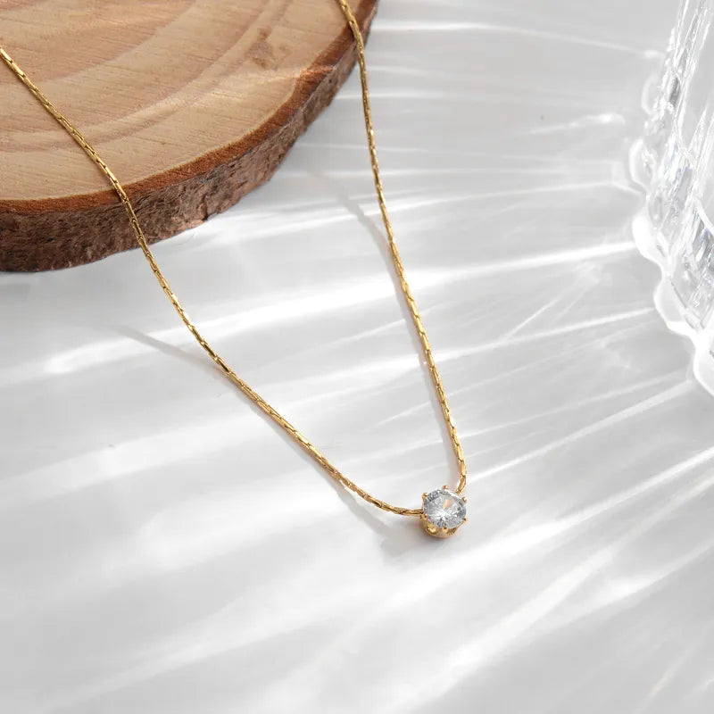 COLGANTE DORADO DE ACERO INOXIDABLE