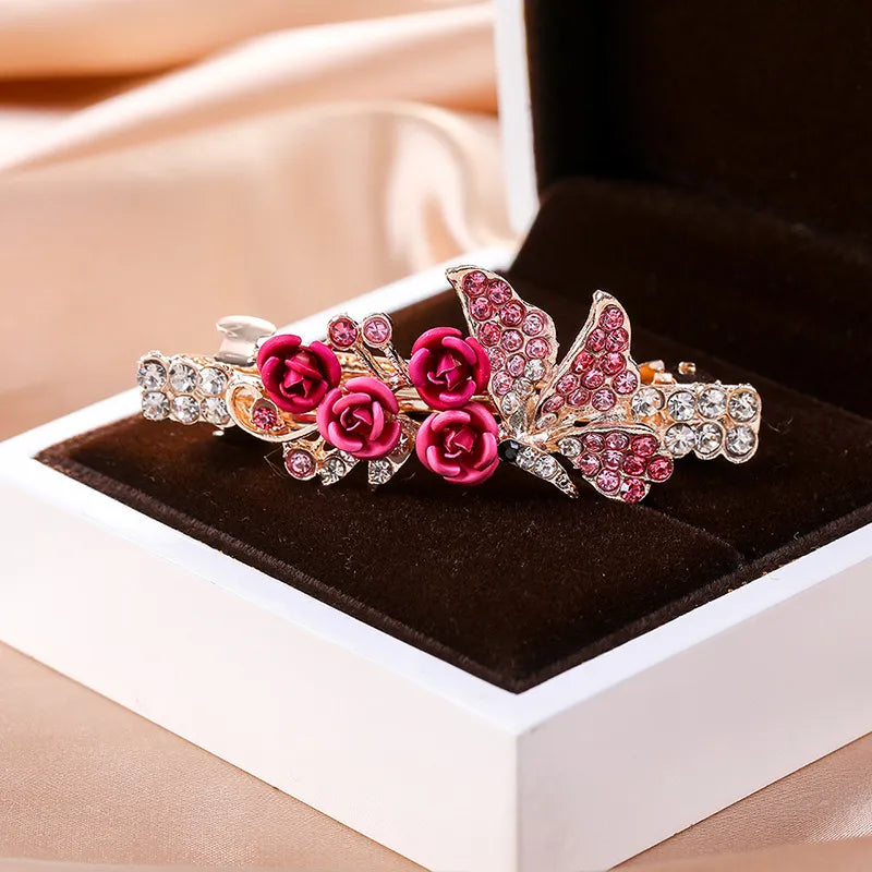 PINZA PARA EL CABELLO CON DIAMANTE ROSADOS
