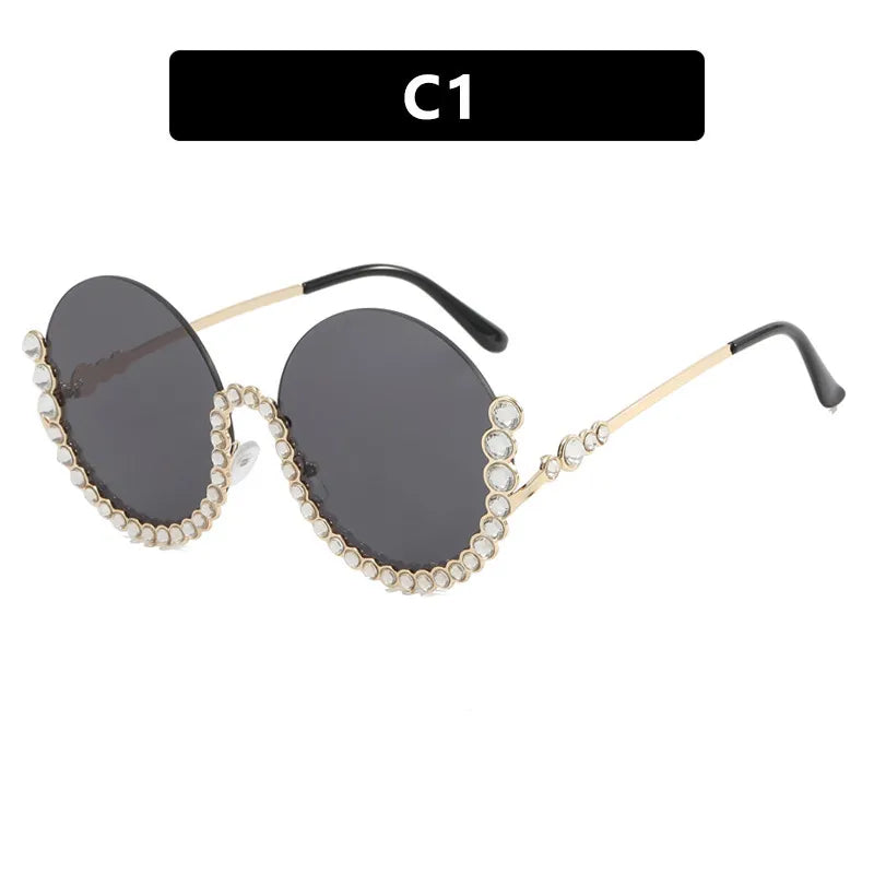 LENTES DE SOL REDONDO CON MARCO DE DIAMANTES Daghidelivery